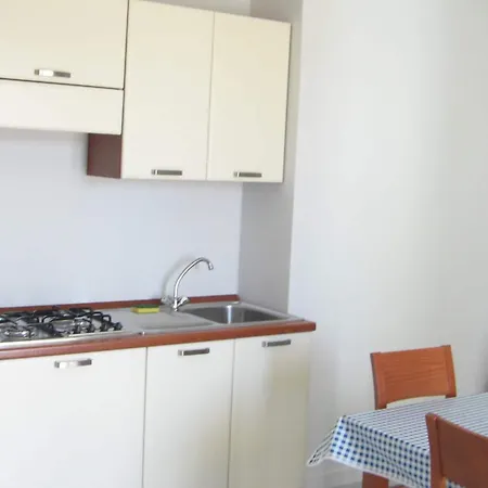 מלון דירות Isola Rossa בוסה